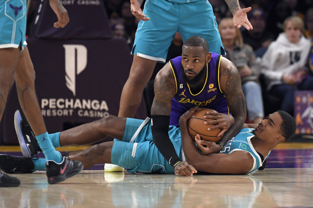 NBA news 2022 LeBron James sneaker comes off on game tying attempt Lakers vs Hornets highlights scores result