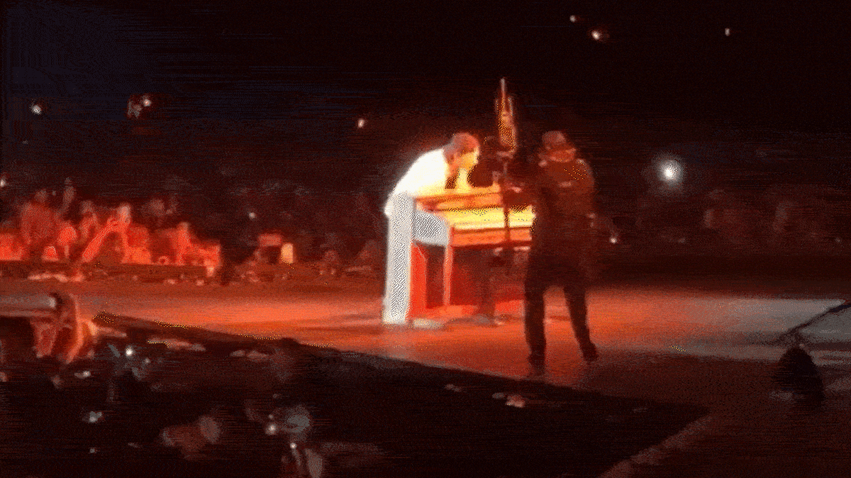 Country singer Morgan Wallen flips over and breaks piano on stage