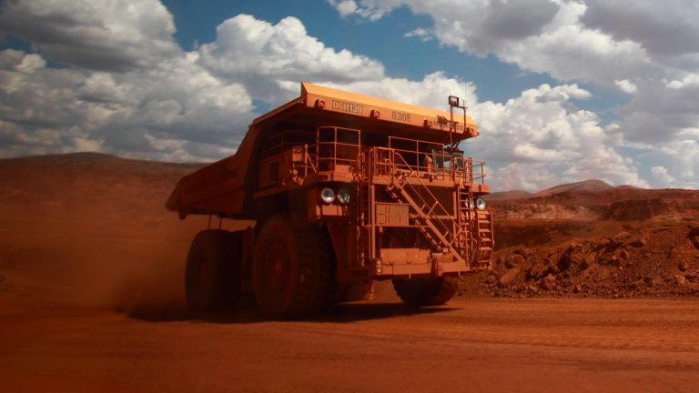 Iron ore surges 5.9pc after BHP Billiton slows growth pace