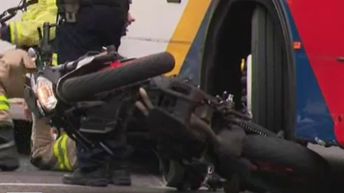 Adelaide crash: Motorcyclist trapped under bus after collision | Nine ...