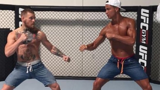 Real Madrid winger Cristiano Ronaldo drops in on UFC star Conor