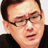 Yang Hengjun, as a worker in the Ministry of State Security, a pro-Democracy advocate, and with his wife.