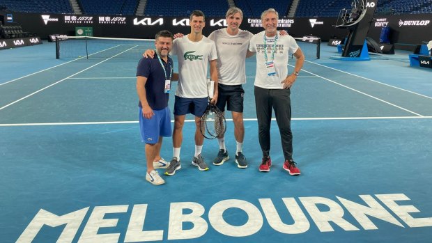 Novak Djokovic at Rod Laver Arena on Monday night with his team, including coach Goran Ivanisevic to Djokovic’s right.