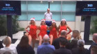7News Perth news director Ray Kuka addresses staff behind four women dressed up as “sexy Santas”.