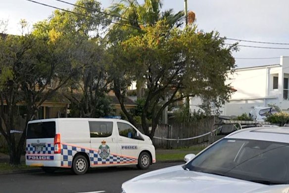 Police tape was draped across a Gold Coast residence after the fatal shooting.