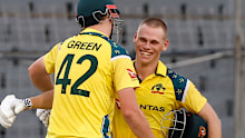 Australia's Cameron Green congratulates Cooper Connolly for scoring a century.