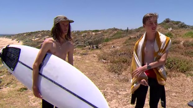 Bryce Hickman and his brother Jared went straight back into the water after their close encounter with a shark. 