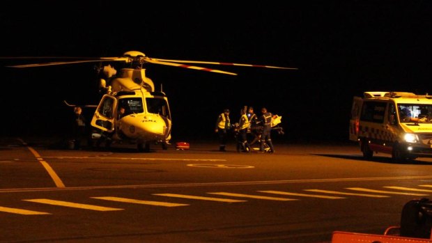 The TOLL paramedic helicopter  taking the victims of the light plane crash to a Sydney hospital.