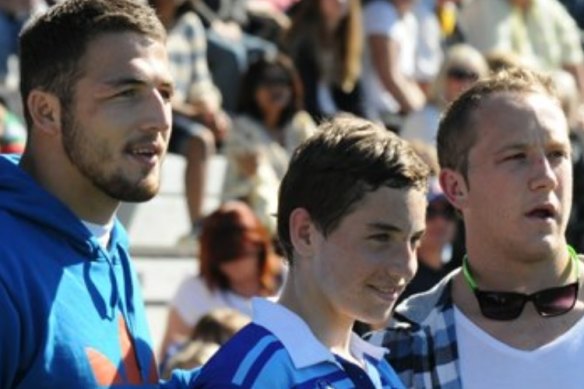 Cameron Murray with Sam Burgess and Jason Clark after winning a grand final with Mascot Jets at Redfern Oval in 2013.