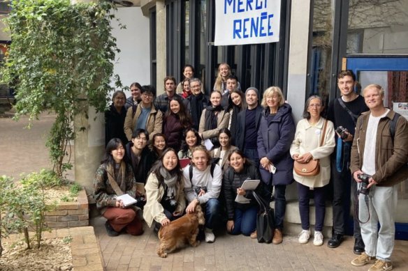 University of Sydney architecture students in front of the “Merci Renee” banner made by residents of the social housing renewal project Ivry-Sur-Seine.  
