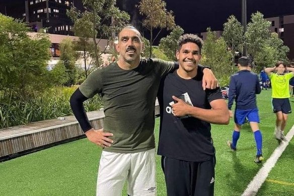 Adam Goodes with John Moriarty Football scholarship holder Tobias Patterson Gregory after a recent Waverley Old Boys game.