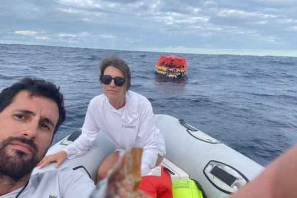 Rick Rodriguez takes a selfie of himself and Alana Litz adrift in the Pacific.