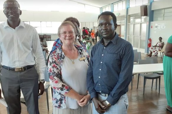 Wallon-based environmentalist and anti-dump campaigner Ursula Monsiegneur is an 2020  Ipswich mayoral candidate. She is pictured here with members of the South Sudanese Christian Church.