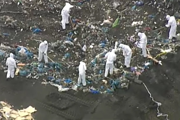 Police search a landfill site in Wollert on Tuesday as part of the investigation into the disappearance of Ju Zhang. 