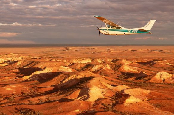 Flying over the Painted Hills, an optional side trip during the Ghan’s journey from Darwin to Adelaide.