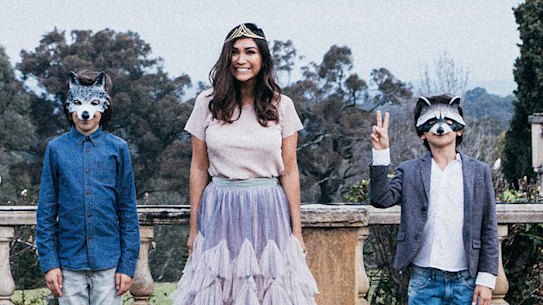 Justine Cullen in her Dries Van Noten birthday skirt, accompanied by two of her sons.