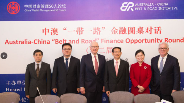 Jean Dong, second from right, was involved in setting up the board that advised on Victoria's Belt and Road deal.