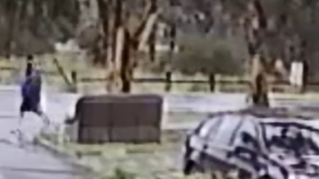 CCTV has captured a man appearing to flee the scene after an attempted abduction of a young girl who was riding her bike to school in the city's north-east.