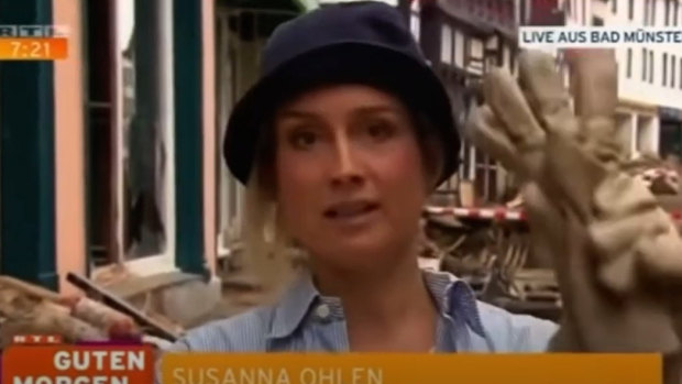 Screen grabs from RTL.de footage of a news report by German TV reporter Susanna Ohlen who was later suspended after being caught allegedly smearing herself with mud.