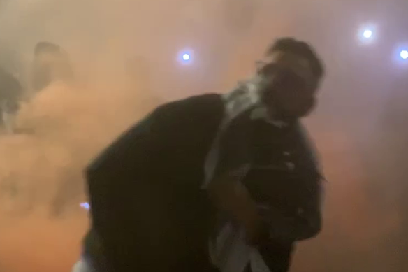 NSW Police have released footage of a man throwing a flare at the Opera House as they call out to members of the public to assist in giving information. 