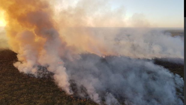 Backburning on Friday to contain the Mackel Airfield fire will likely push smoke towards southern Sydney and the Illawarra over the weekend.