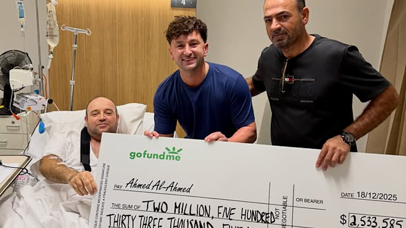 ‘Aussie, Aussie, Aussie’: Ahmed al Ahmed receives $2.5 million cheque in hospital bed