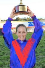 Bjorn Baker’s effort to let Carl Holt see his colours with the Grafton Cup.