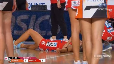 Floored: Maddy Proud after the semi-final collision in which she broke a rib.