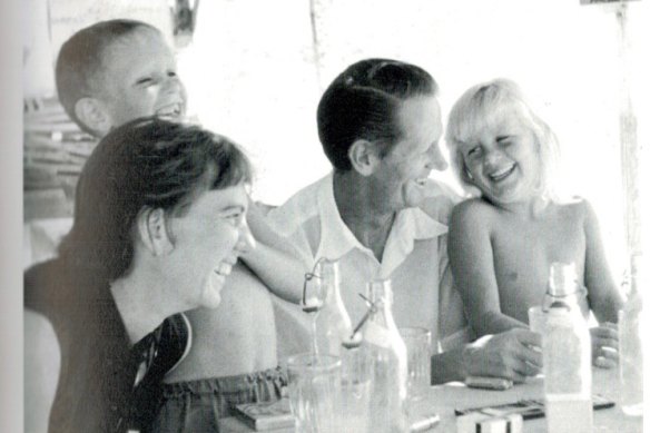 Clift and Johnston, with children Martin and Shane, enjoying an outdoor lunch in Kalymnos.