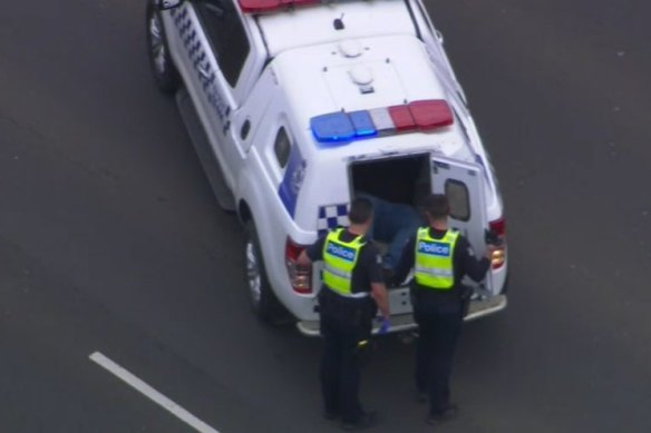 Driver charged after woman falls from moving car on Princes Freeway