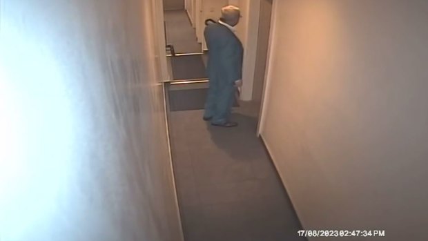 The CCTV footage ends with the man walking into a room.