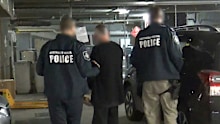 The man is arrested by AFP officers.