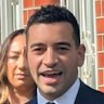 Real estate agent Max Mercuri runs the auction at 134 Richardson Street, Albert Park.
