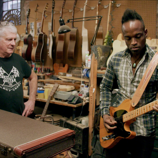 Kelly with The Roots’ guitarist Kirk Douglas in the documentary Carmine Street Guitars.