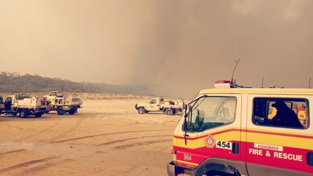 An image shared by QFES on Monday showing the scene on Fraser Island as the bushfire continued to burn. 