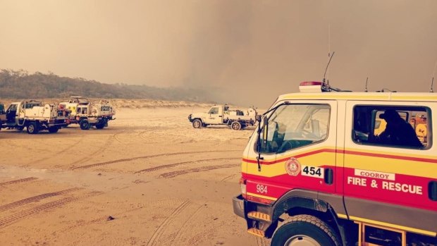 Firefighters have been trying to contain a bushfire on Fraser Island for weeks. 