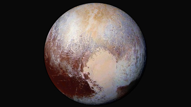In this combination of images captured by the New Horizons spacecraft and given enhanced colours, the differences in the composition and texture of Pluto's surface can be seen. 