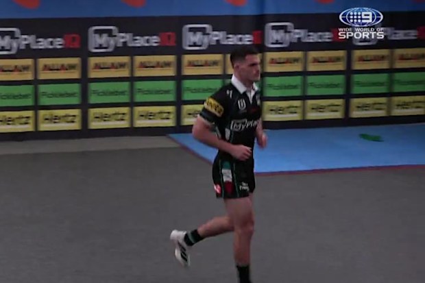Nathan Cleary warms up alone in Penrith’s sheds.