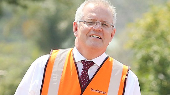 Prime Minister Scott Morrison arrives at a construction site in Brisbane on Wednesay to announce new infrastructure deals. 