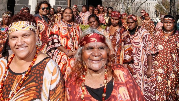 Stars of The Song Keepers, the Central Australian Women's Aboriginal Choir, outside the German Lutheran Trinity Church in Melbourne.