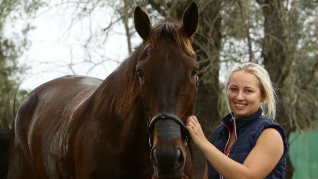 Bitten: Lauren Tritton is back driving after recovering from a redback spider bite.