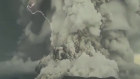 The explosion on Saturday off Tonga, with lightening seen nearby.