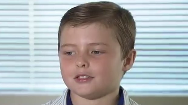 John Meredith, 9, said he was confused by the situation after his flight was diverted to Melbourne and he had to spend the night at the airport. 