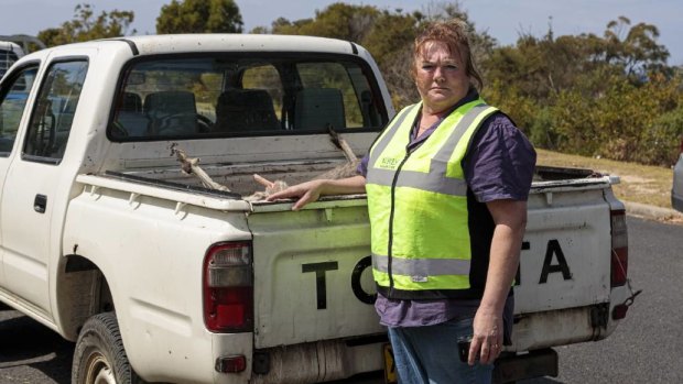WIRES volunteer Janine Green collecting the dead kangaroos.