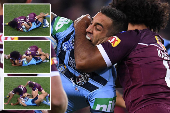 Paul Vaughan gets manhandled by Felise Kaufusi - just one of several tackles the Blues were furious about.