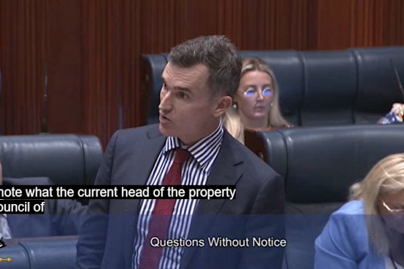 Minister John Carey during question time. 