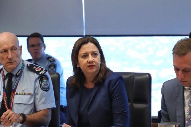 Steve Gollschewski with Premier Annastacia Palaszczuk and her deputy, Steven Miles.