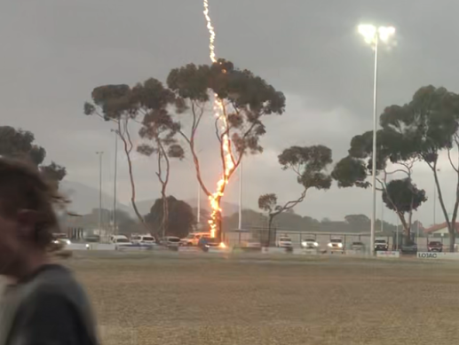 Lightning strike Victoria: Footy players run for cover Bisinella Oval in  Lara