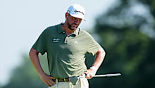 Michael Block looks on from the first green.
