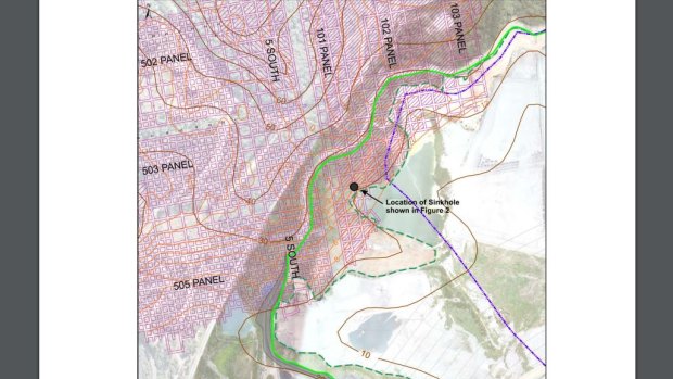 Site map showing the old Awaba coal mine workings (red hatching), the limit of the existing ash dam (broken green line), and the proposed extension of the dam (solid green line). A sinkhole is shown as a black dot.